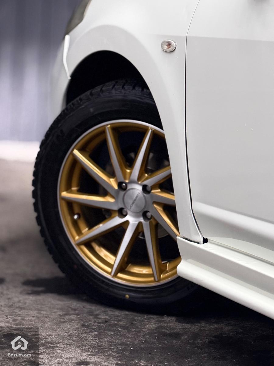 Nissan tiida  - image 5