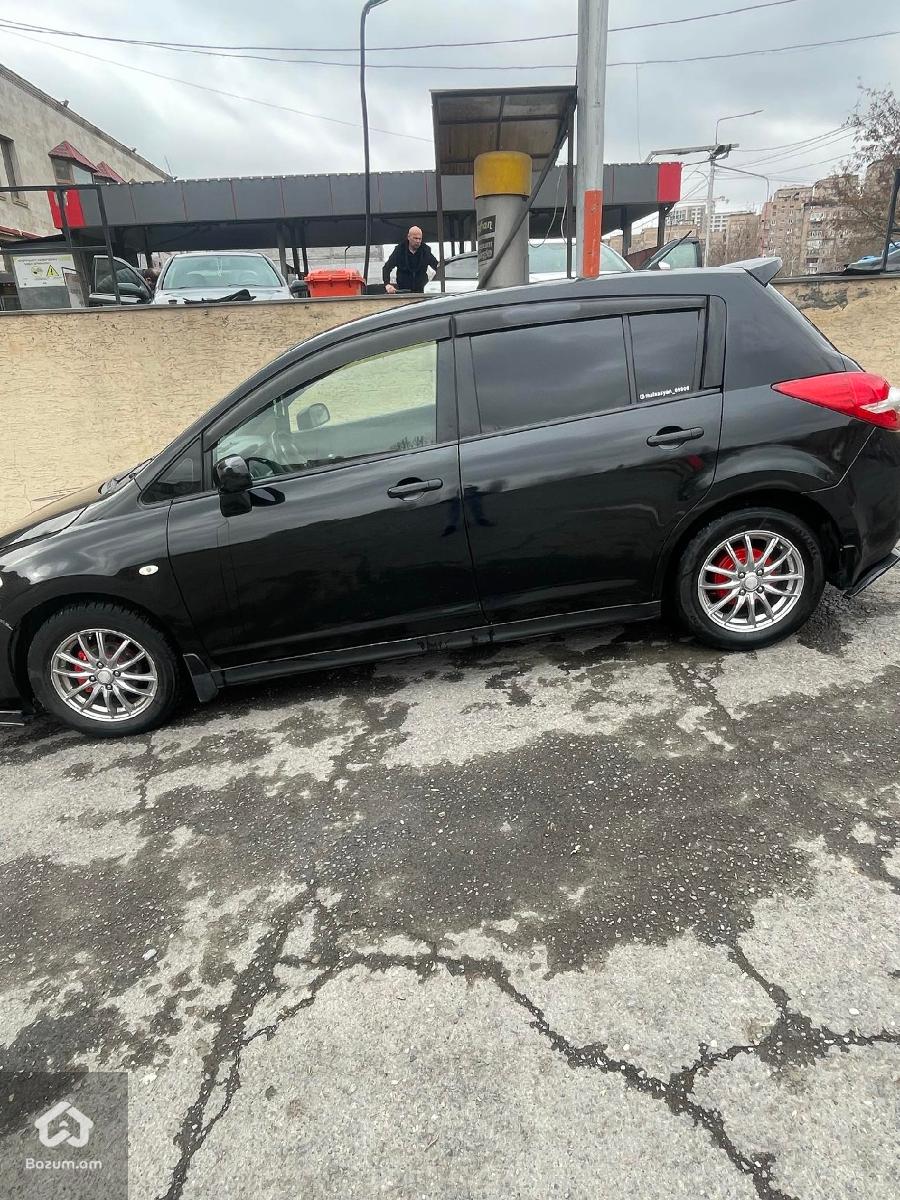 nissan tida - image 2