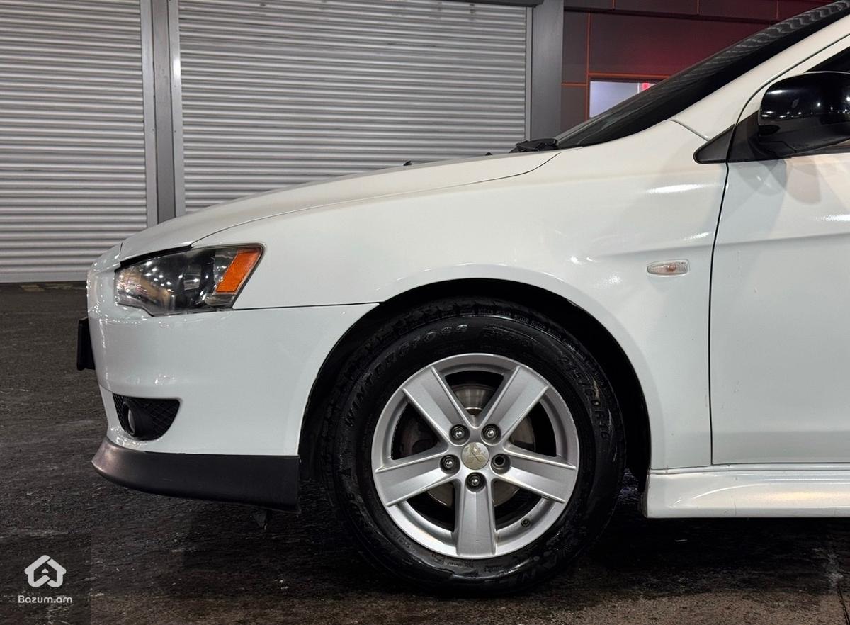 Mitsubishi Lancer - image 11