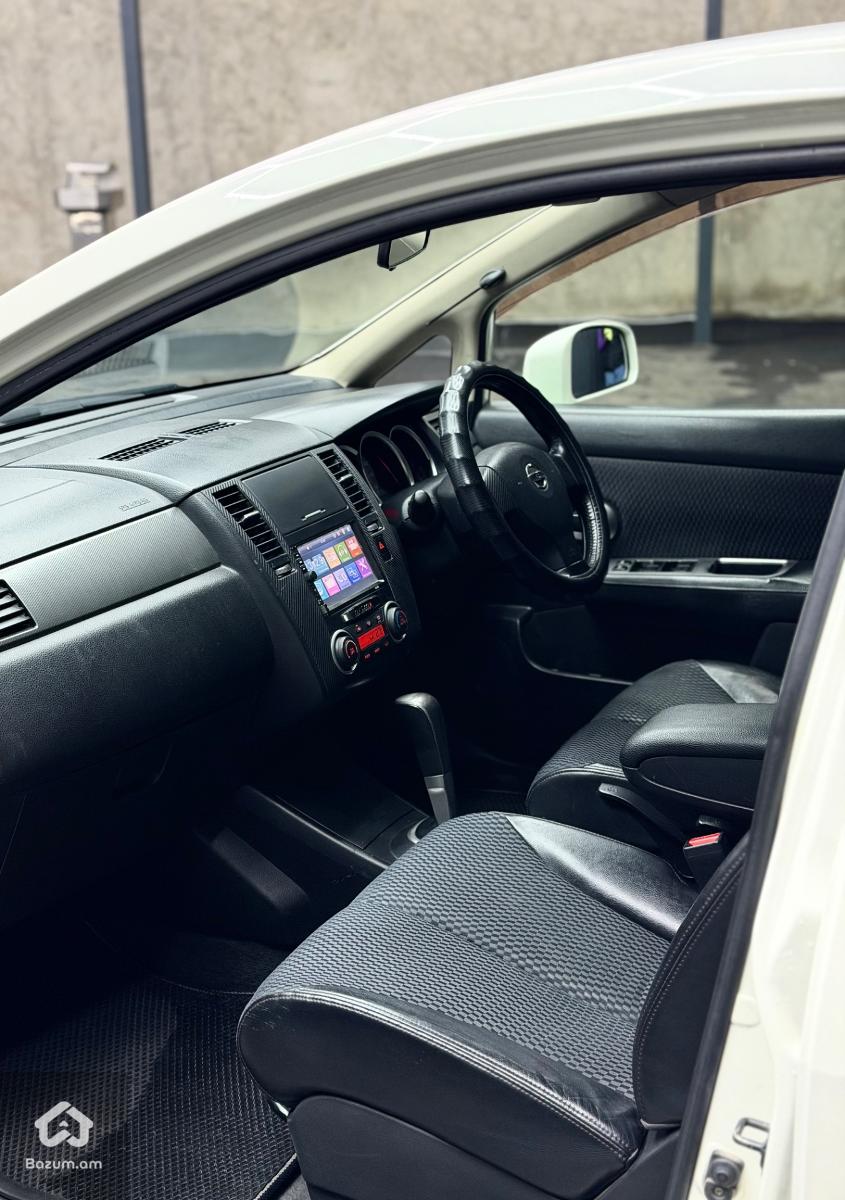 Nissan tiida  - image 8