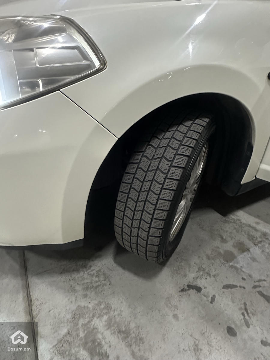 Nissan Tiida 2009-8 - image 8