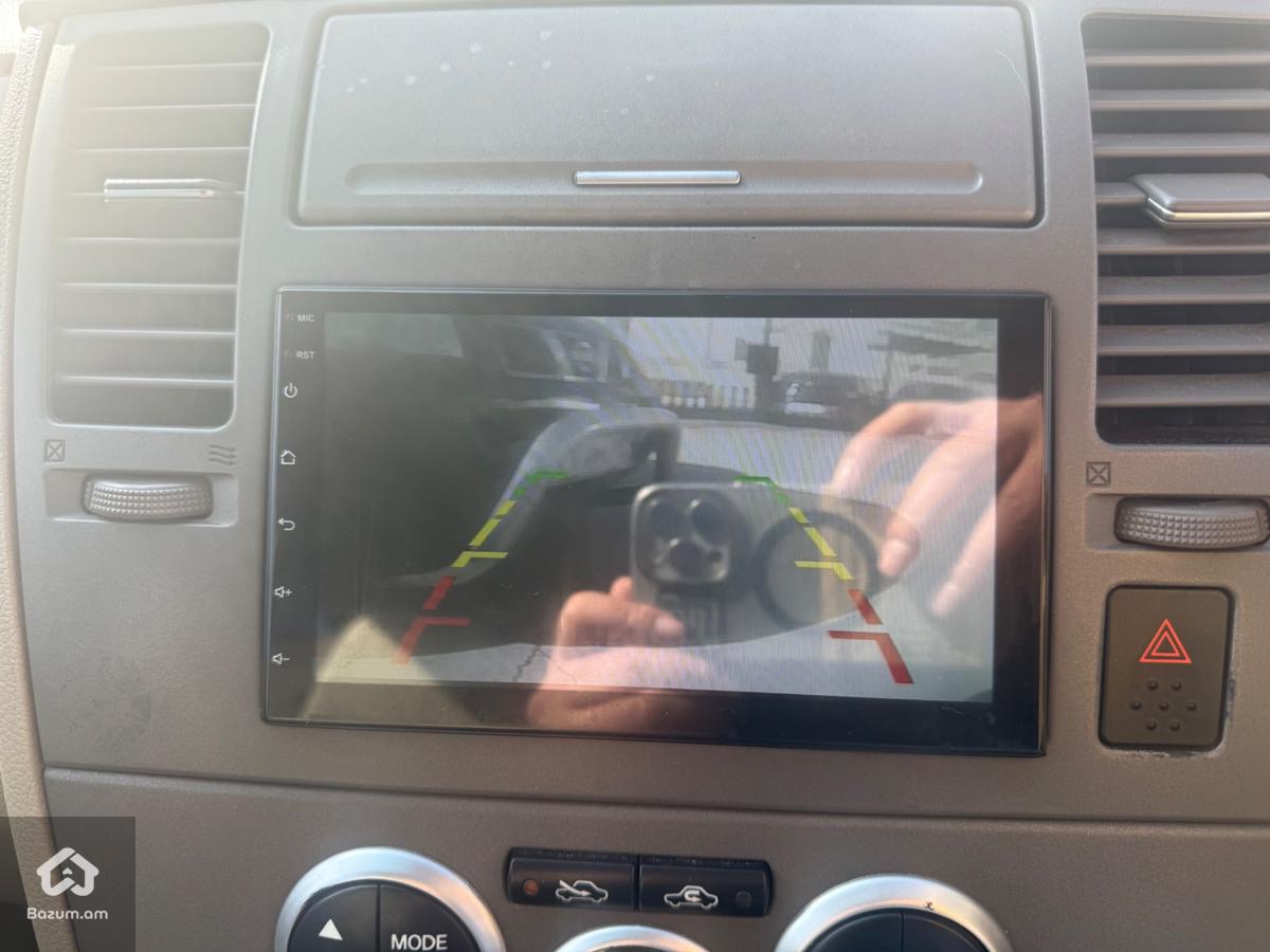 Nissan Tiida - image 12