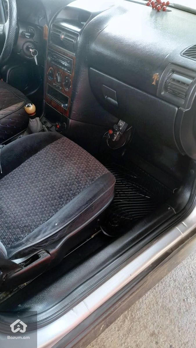 Opel Astra 1999 - image 12