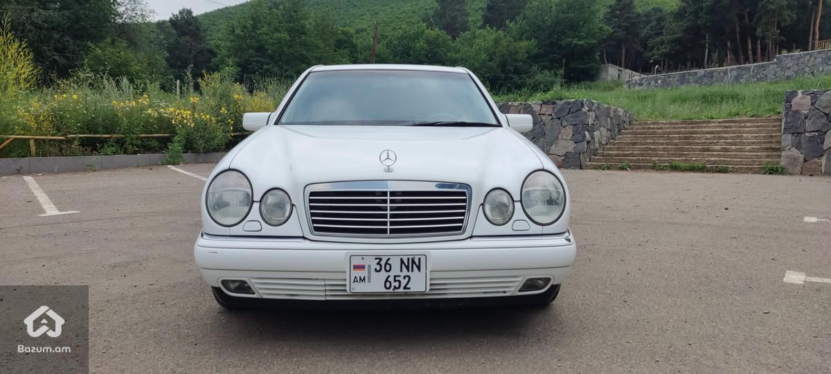 Mercedes-Benz E-Class W210 - image 11