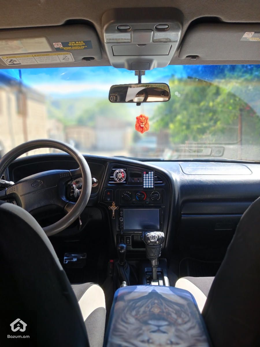 Nissan Pathfinder 2001 - image 9