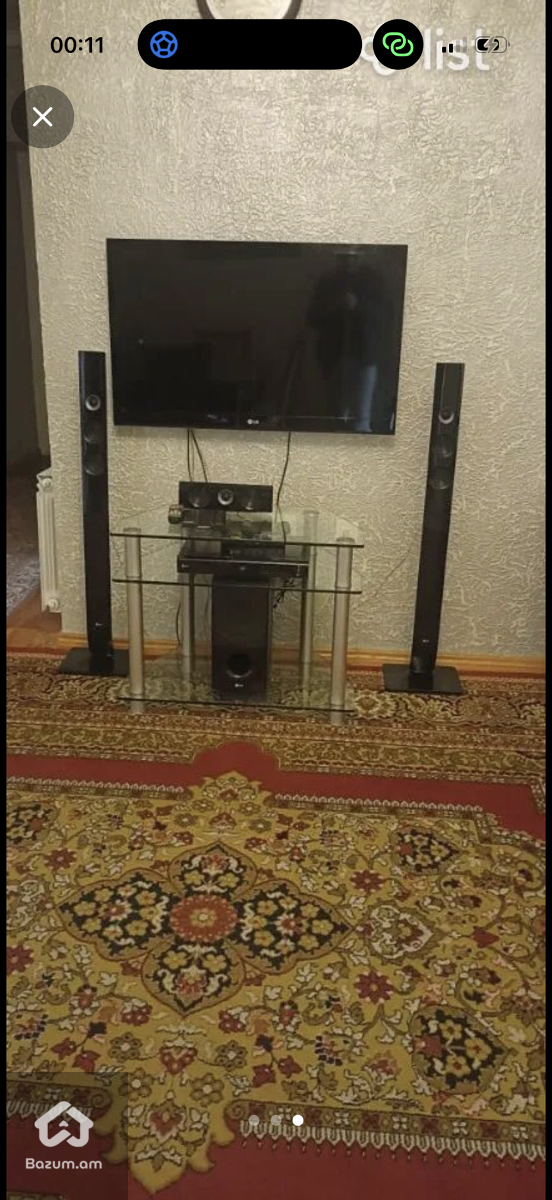 LG հեռուստացույց իր տնային կինոթարոնի հետ միասին - image 1