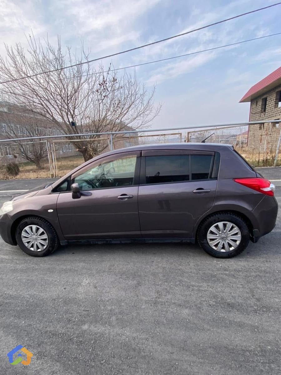 Nissan Tiida - image 7