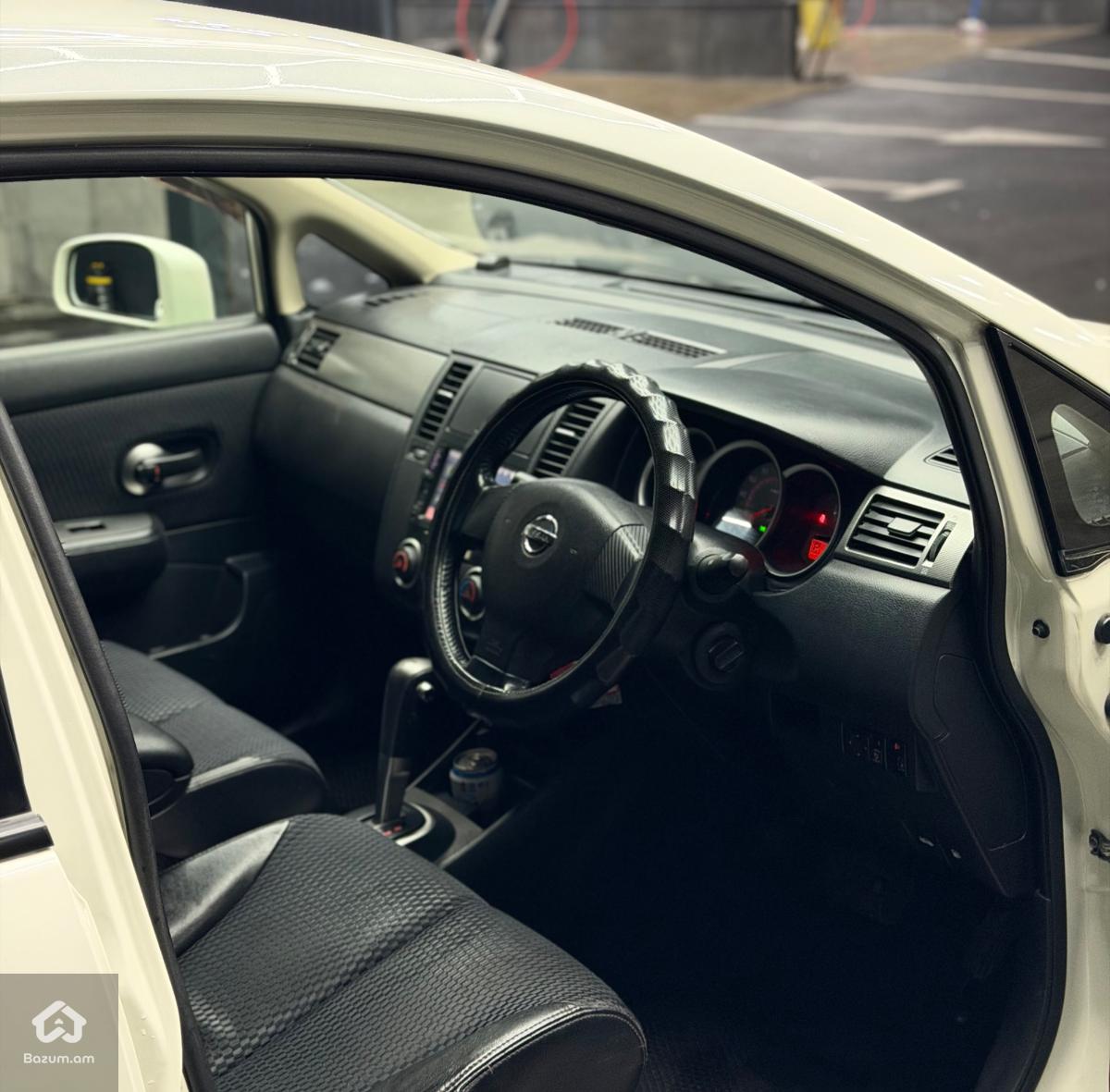 Nissan tiida  - image 7