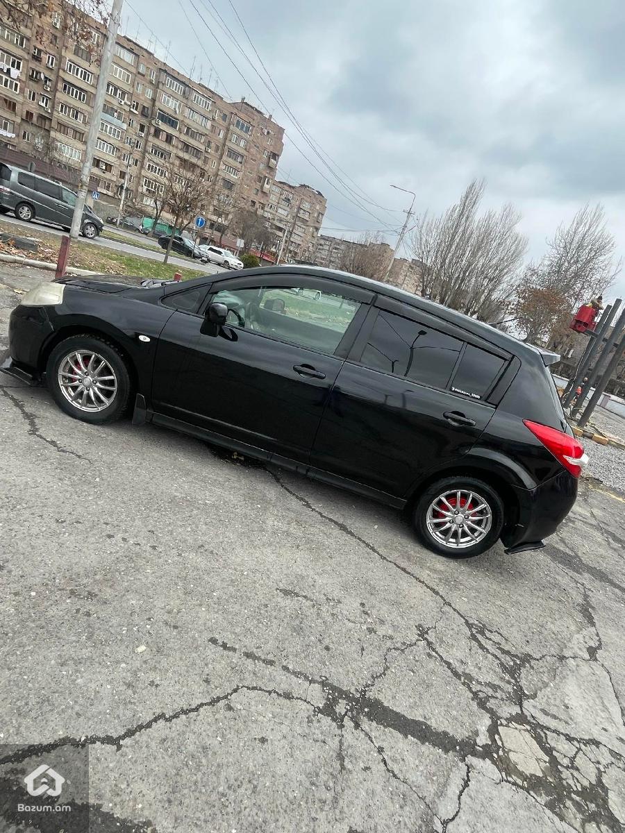 nissan tida - image 4