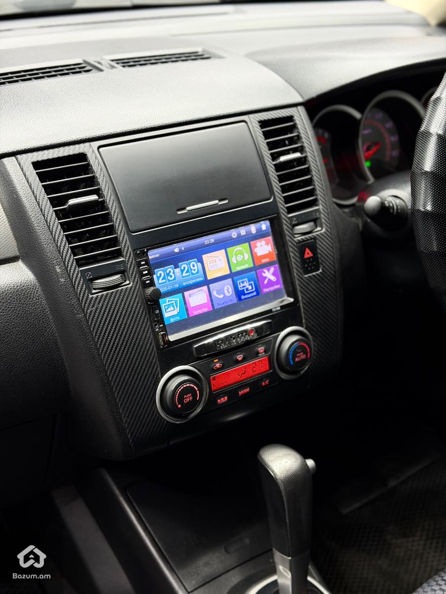 Nissan tiida  - image 9